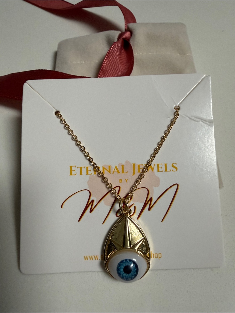 Wren Gold Necklace with Blue Eye Pendant